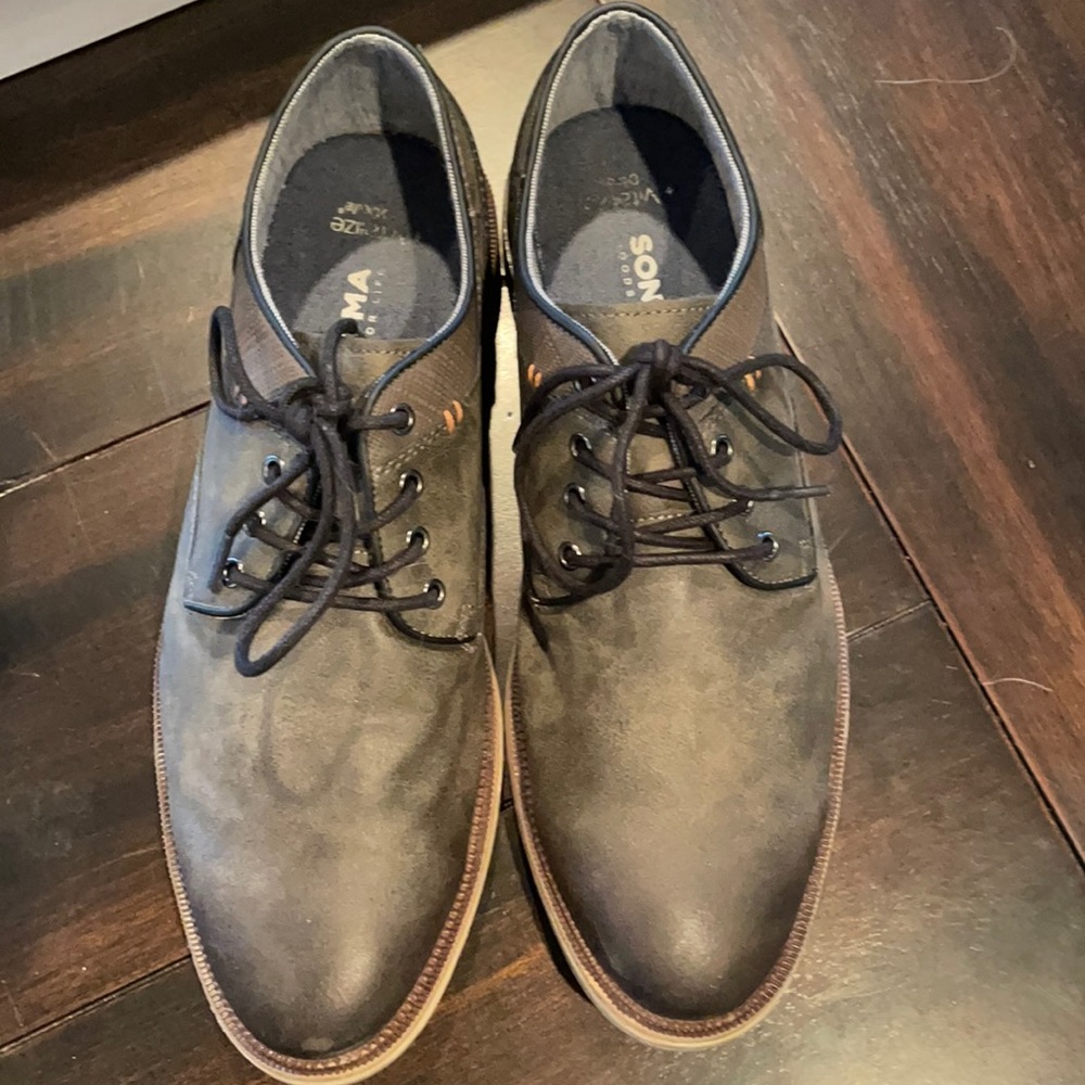 Gently used gray shoes.